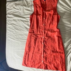 This is a beautiful long reddish orangey dress that my mom didn’t want.